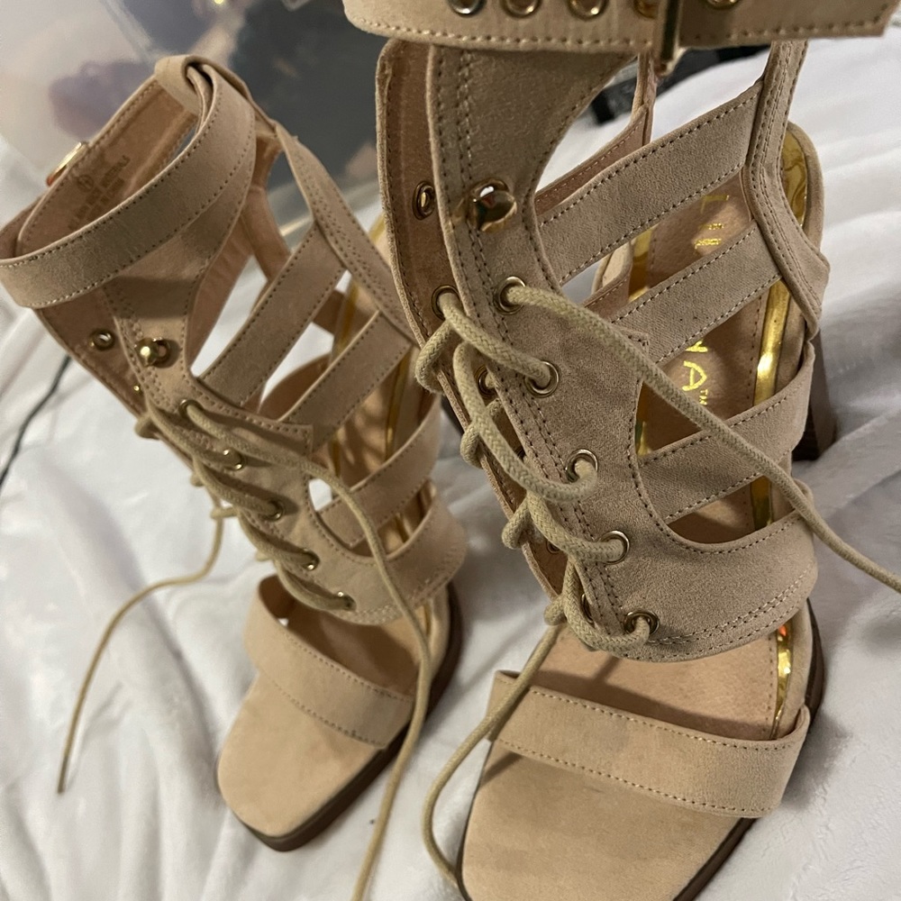 Size 8, cute cream color heels.